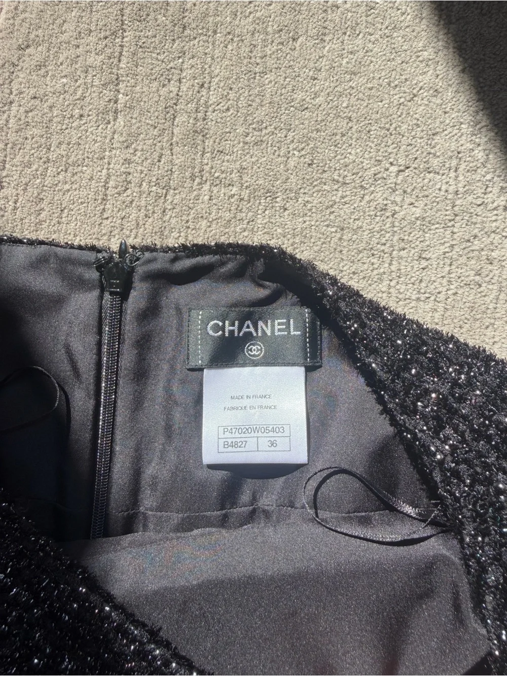 CHANEL Black Sparkle Tweed Mini Skirt with Quilted Hem